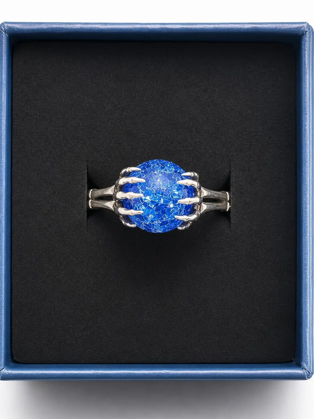 S925 Sterling Silver Ring Features A Brilliant Crackle Blue Gemstone.